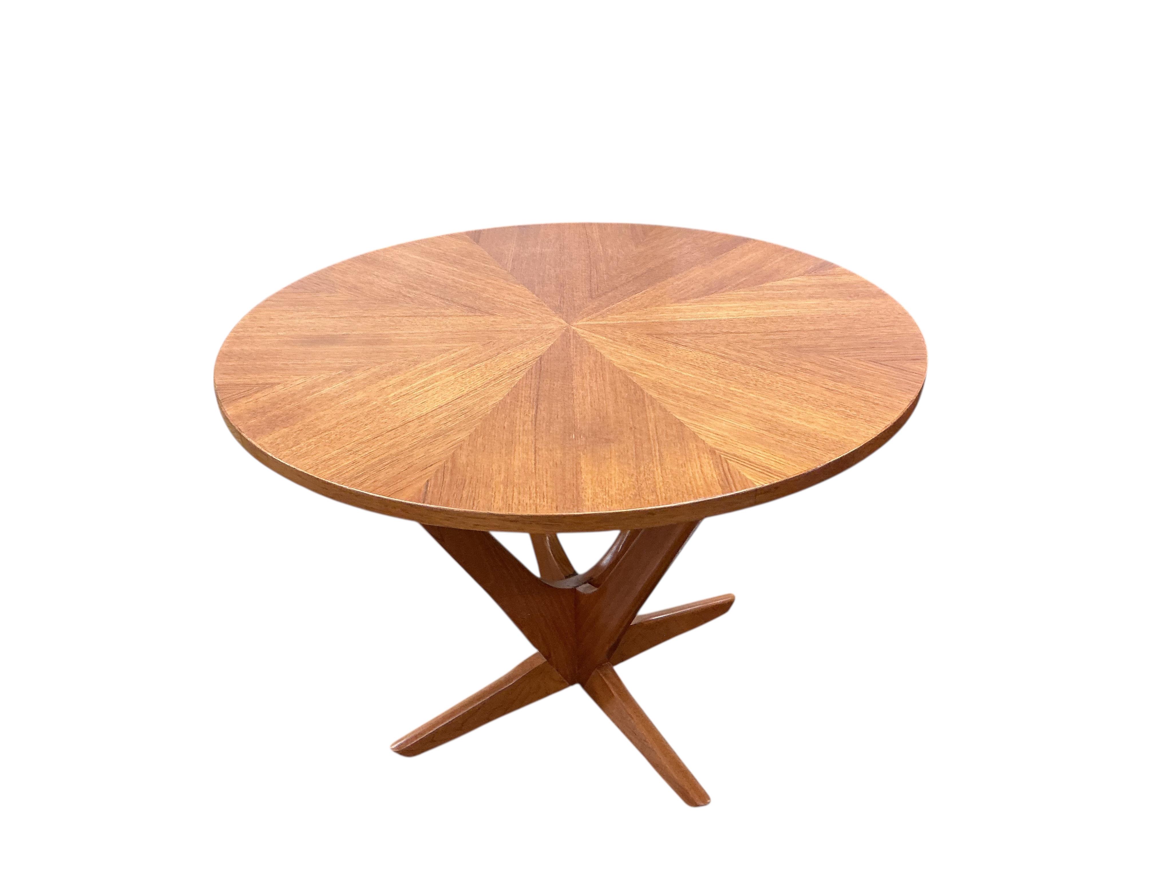 A mid century Danish teak coffee table by Georg Jensen for Kubus, diameter 78cm, height 55cm